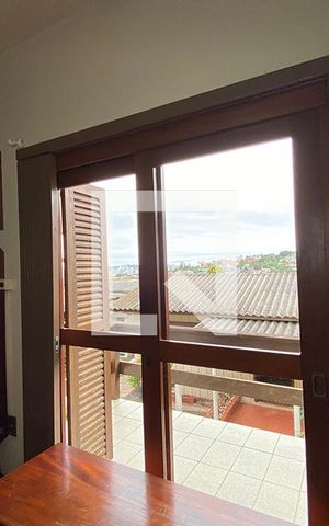 Casa à venda com 180m², 3 quartos e 2 vagasPorta Janela do Quarto 1