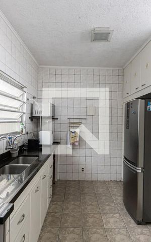Casa à venda com 165m², 3 quartos e 3 vagas Casa à venda com 165m², 3 quartos e 3 vagasCozinha