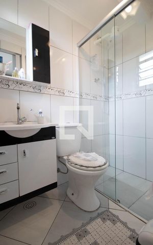 Casa à venda com 90m², 3 quartos e 2 vagas Casa à venda com 90m², 3 quartos e 2 vagasBanheiro da Suíte 1 (Casa 1)