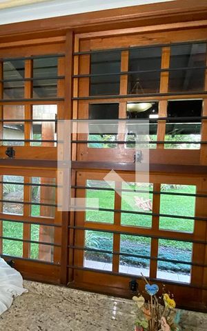 Casa à venda com 411m², 4 quartos e 3 vagasSala