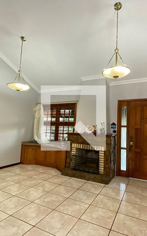 Casa à venda com 411m², 4 quartos e 3 vagasSala