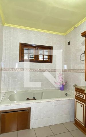 Casa à venda com 411m², 4 quartos e 3 vagasBanheiro da Suíte 3