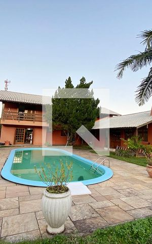 Casa à venda com 411m², 4 quartos e 3 vagasPiscina