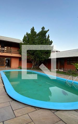 Casa à venda com 411m², 4 quartos e 3 vagasPiscina