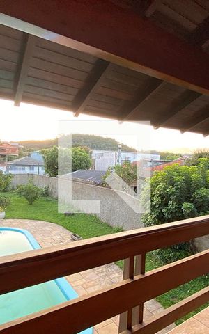 Casa à venda com 411m², 4 quartos e 3 vagasVaranda da Suíte 2