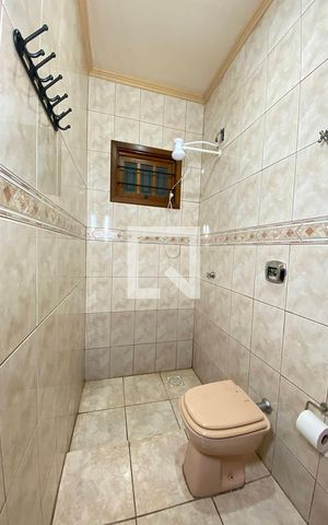 Casa à venda com 411m², 4 quartos e 3 vagasBanheiro da Suíte 1