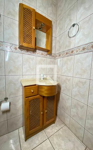 Casa à venda com 411m², 4 quartos e 3 vagasBanheiro da Suíte 1