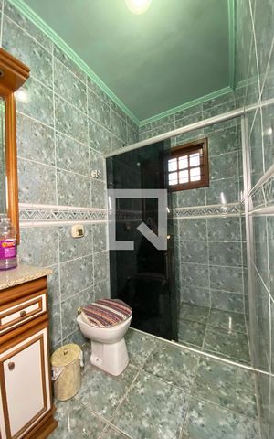Casa à venda com 411m², 4 quartos e 3 vagasBanheiro da Suíte 4