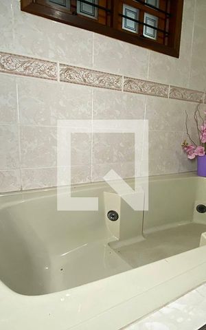 Casa à venda com 411m², 4 quartos e 3 vagasBanheiro da Suíte 3