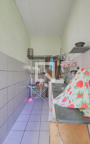 Casa à venda com 450m², 4 quartos e 3 vagasCasa 1 - Área de Serviço
