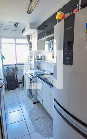 Apartamento à venda com 49m², 2 quartos e 1 vaga Apartamento à venda com 49m², 2 quartos e 1 vagaCozinha e Área de Serviço
