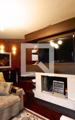 Casa de condomínio à venda com 363m², 3 quartos e 4 vagasSala de TV