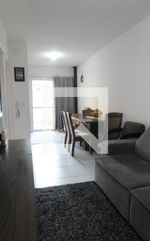 Casa de condomínio à venda com 75m², 3 quartos e 2 vagasSala de Estar