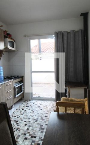 Casa de condomínio à venda com 75m², 3 quartos e 2 vagasSala de Estar