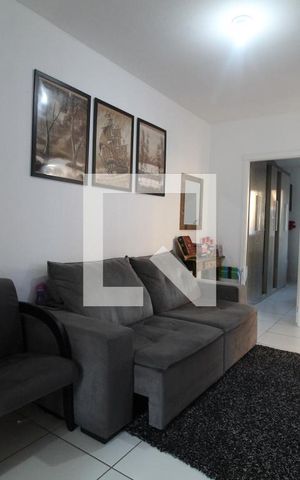 Casa de condomínio à venda com 75m², 3 quartos e 2 vagasSala de Estar