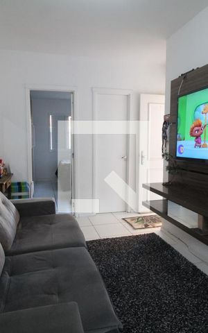 Casa de condomínio à venda com 75m², 3 quartos e 2 vagasSala de Estar