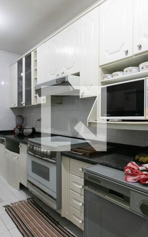 Casa à venda com 93m², 3 quartos e 2 vagas Casa à venda com 93m², 3 quartos e 2 vagasCozinha