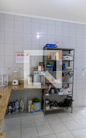 Casa à venda com 220m², 4 quartos e 5 vagas Casa à venda com 220m², 4 quartos e 5 vagasCozinha