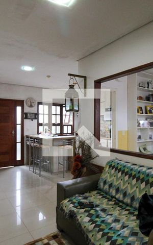 Casa à venda com 112m², 3 quartos e 3 vagas Casa à venda com 112m², 3 quartos e 3 vagasSala/Cozinha