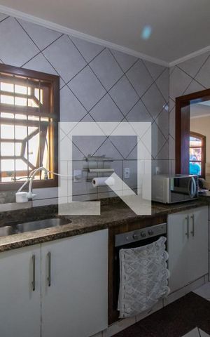 Casa à venda com 232m², 4 quartos e 6 vagas Casa à venda com 232m², 4 quartos e 6 vagasCozinha