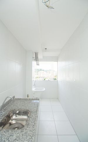 Apartamento à venda com 46m², 2 quartos e 1 vaga Apartamento à venda com 46m², 2 quartos e 1 vagaCozinha e área de serviço