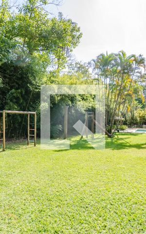 Casa de condomínio à venda com 400m², 5 quartos e 2 vagasÁrea Externa - QuintalÁrea Externa - Quintal