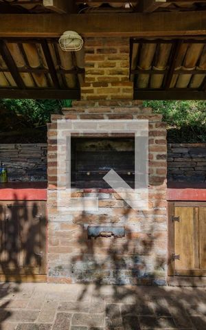 Casa de condomínio à venda com 400m², 5 quartos e 2 vagasChurrasqueira
