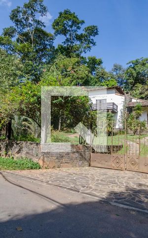 Casa de condomínio à venda com 400m², 5 quartos e 2 vagasFachada