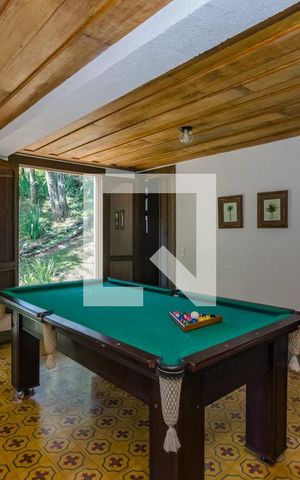 Casa de condomínio à venda com 400m², 5 quartos e 2 vagasSala
