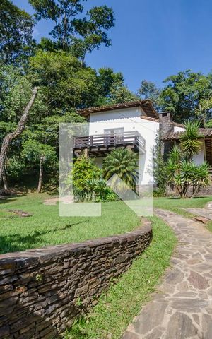 Casa de condomínio à venda com 400m², 5 quartos e 2 vagasFachada