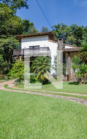 Casa de condomínio à venda com 400m², 5 quartos e 2 vagasFachada