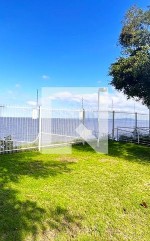 Casa de condomínio para alugar com 245m², 3 quartos e 2 vagasVista para o Guaiba