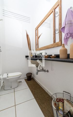 Casa de condomínio à venda com 400m², 3 quartos e 4 vagasLavabo