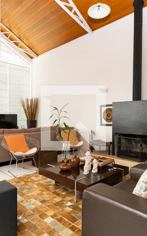 Casa de condomínio à venda com 400m², 3 quartos e 4 vagasSala