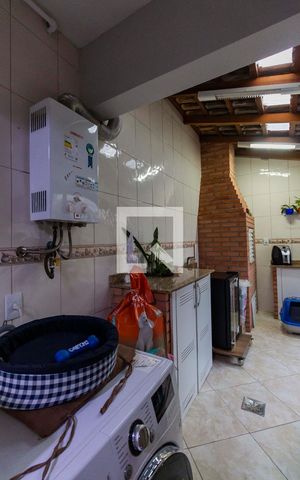 Casa de condomínio à venda com 100m², 3 quartos e 1 vaga Casa de condomínio à venda com 100m², 3 quartos e 1 vagaLavanderia