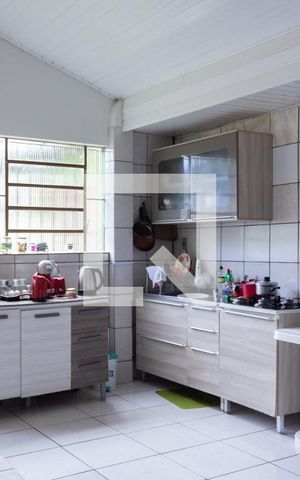 Casa à venda com 70m², 2 quartos e 3 vagas Casa à venda com 70m², 2 quartos e 3 vagasCozinha