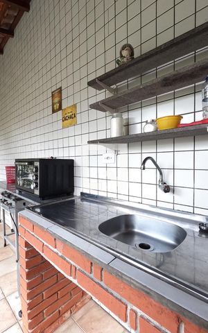 Casa à venda com 404m², 5 quartos e 4 vagasChurrasqueira