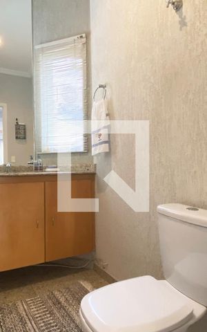Casa de condomínio à venda com 420m², 4 quartos e 4 vagasLavabo