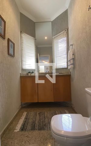 Casa de condomínio à venda com 420m², 4 quartos e 4 vagasLavabo