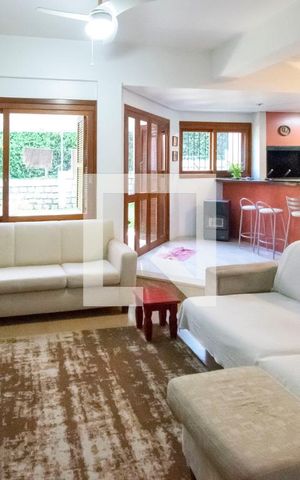 Casa de condomínio à venda com 284m², 5 quartos e 4 vagas Casa de condomínio à venda com 284m², 5 quartos e 4 vagasSala de Estar