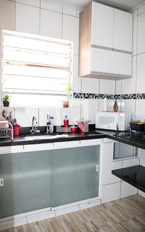 Casa à venda com 400m², 4 quartos e 2 vagas Casa à venda com 400m², 4 quartos e 2 vagasCozinha