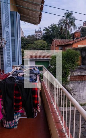 Casa à venda com 281m², 3 quartos e 6 vagas Casa à venda com 281m², 3 quartos e 6 vagasVista Varanda do corredor