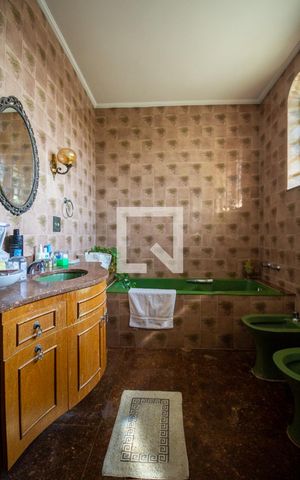 Casa à venda com 450m², 3 quartos e 10 vagas Casa à venda com 450m², 3 quartos e 10 vagasBanheiro da Suíte 1