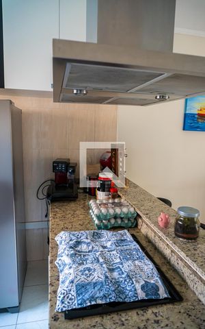 Casa à venda com 125m², 2 quartos e 2 vagas Casa à venda com 125m², 2 quartos e 2 vagasCozinha