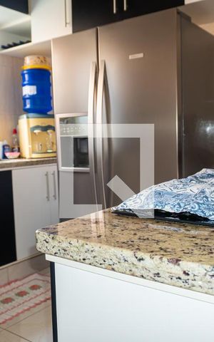Casa à venda com 125m², 2 quartos e 2 vagas Casa à venda com 125m², 2 quartos e 2 vagasCozinha