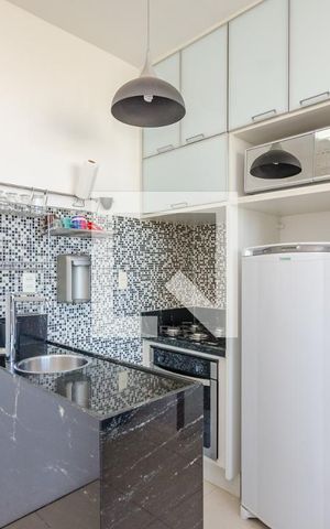 Apartamento à venda com 34m², 1 quarto e 1 vaga Apartamento à venda com 34m², 1 quarto e 1 vagaCozinha