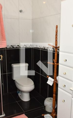 Casa para alugar com 371m², 3 quartos e 8 vagasBanheiro da Suíte 1