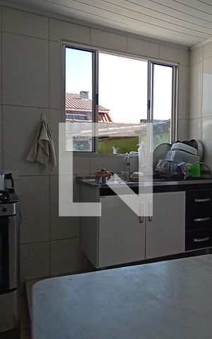 Casa à venda com 130m², 4 quartos e 2 vagas Casa à venda com 130m², 4 quartos e 2 vagasCozinha