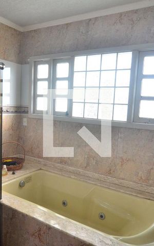 Casa à venda com 292m², 4 quartos e 3 vagasBanheiro Suíte