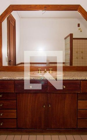 Casa de condomínio à venda com 1400m², 1 quarto e 4 vagasBanheiro da Suíte 3